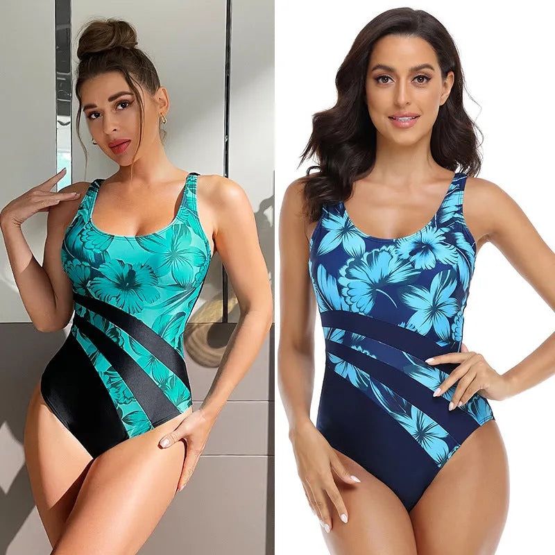 Blue or green women's conservative brief one-piece swimsuit with a printed, tight fit.