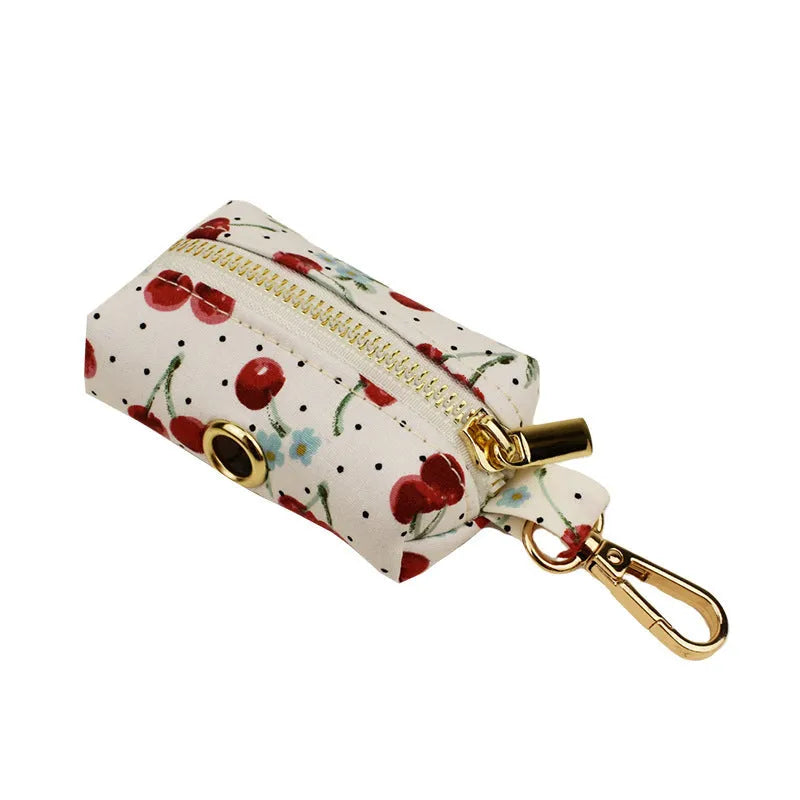 Red cherry printed cloth dog collar with light gold buckle and detachable bow strap