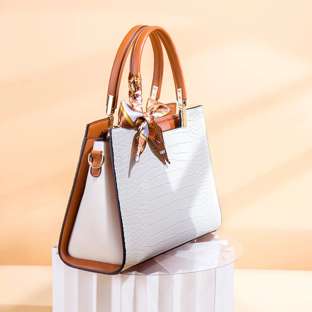 Milky white women's square shoulder handbag made from PU leather, showing slit pocket and clean sewing lines.