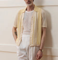 Yellow casual polo shirt with hollow-out asymmetric design and short sleeves in Tencel fabric