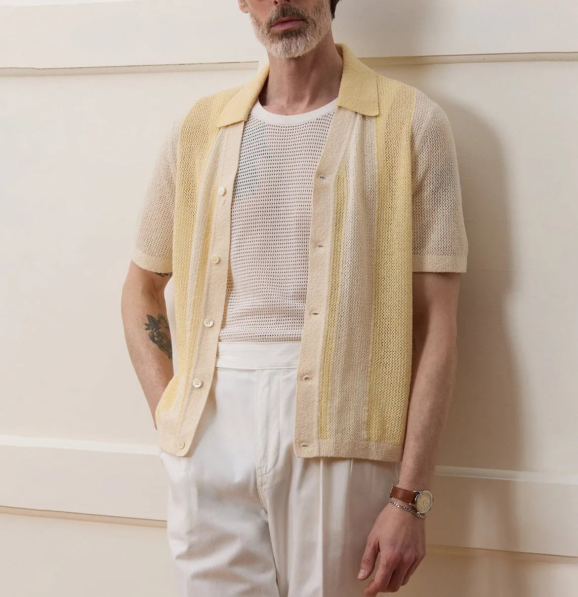 Yellow casual polo shirt with hollow-out asymmetric design and short sleeves in Tencel fabric