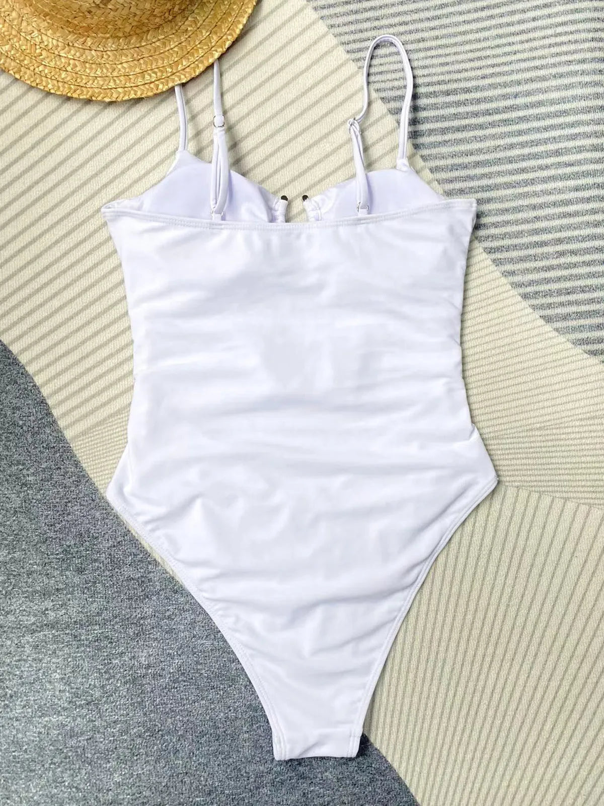 Black women's tight-fitting one-piece nylon swimsuit on a mannequin