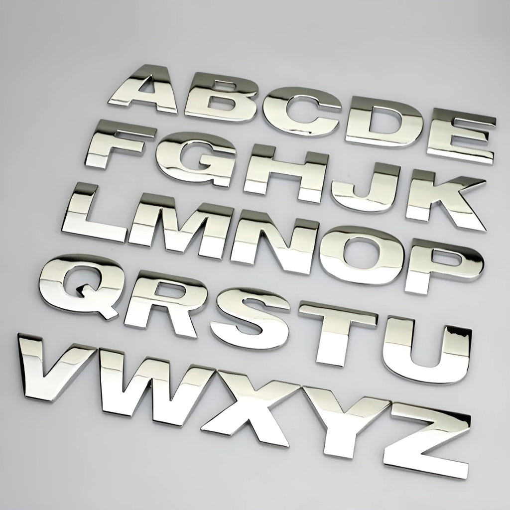 Zinc alloy metal car letter sticker in 3D style, shown in silver finish, approx 2.5cm size.