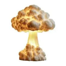 Modern art mushroom cloud atomic explosion shaped USB table lamp on a desk.