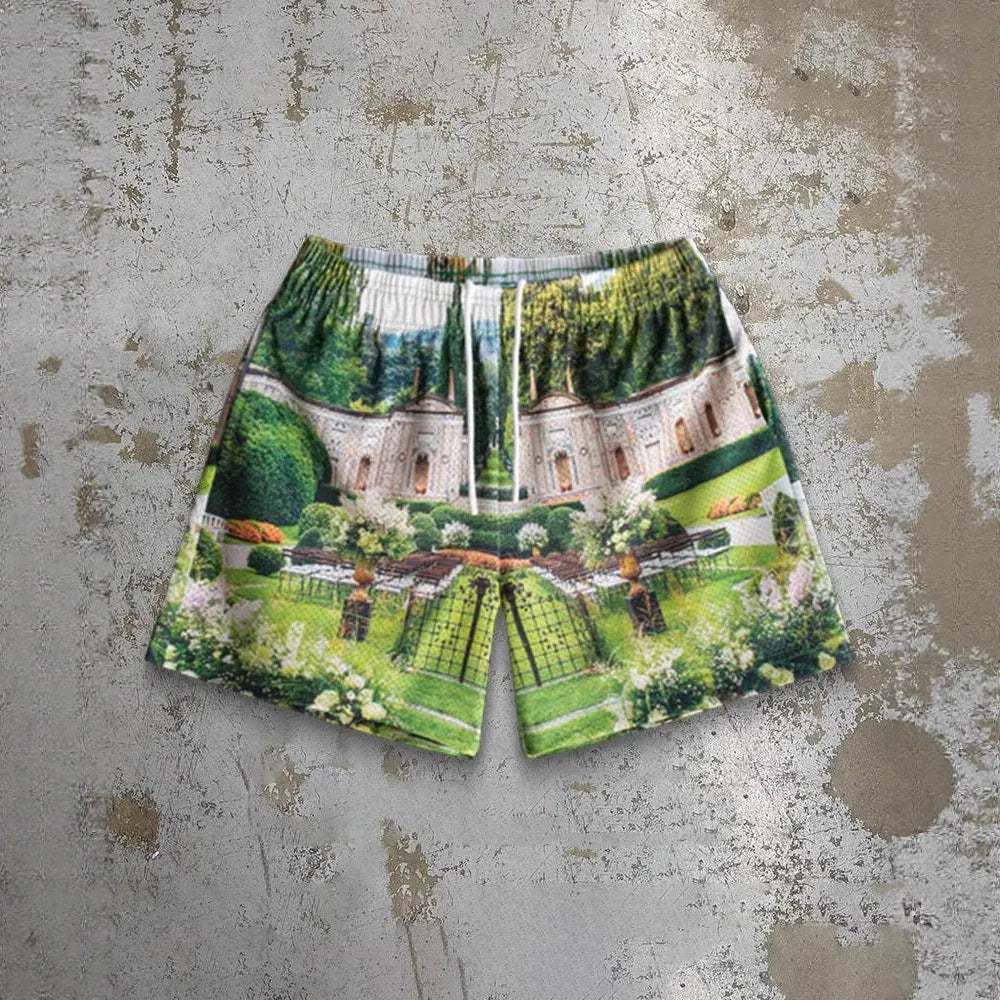 Man wearing loose-fitting digital print beach shorts in a contemporary colour, showing the elastic waistband and quick-dry milk silk fabric.