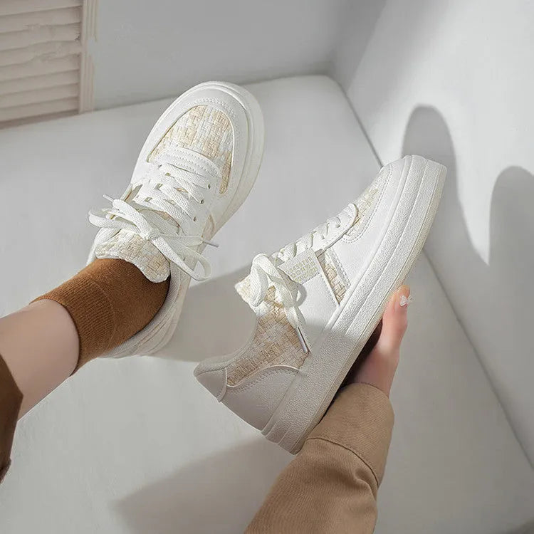 Beige plaid platform leisure sports shoes with white rubber sole and front lace-up fastening.