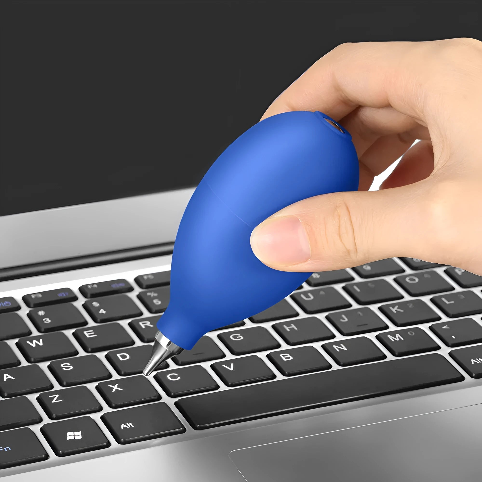 Blue and black rubber dust removal air blower cleaning tool for cameras and phones.