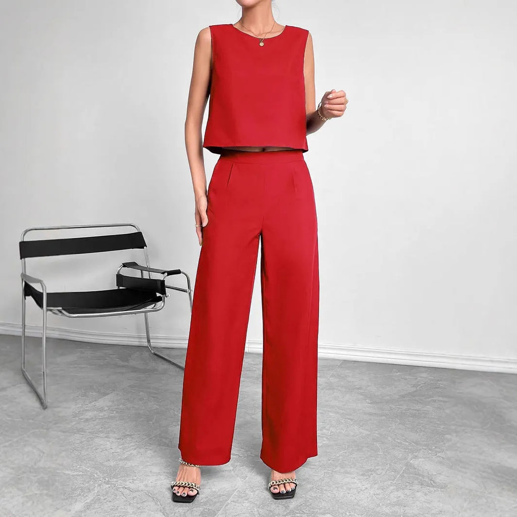Women's red polyester two-piece set with sleeveless round neck top and wide leg trousers