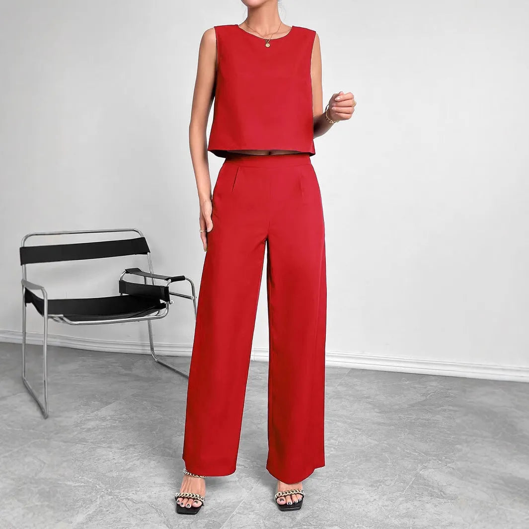 Women's red polyester two-piece set with sleeveless round neck top and wide leg trousers