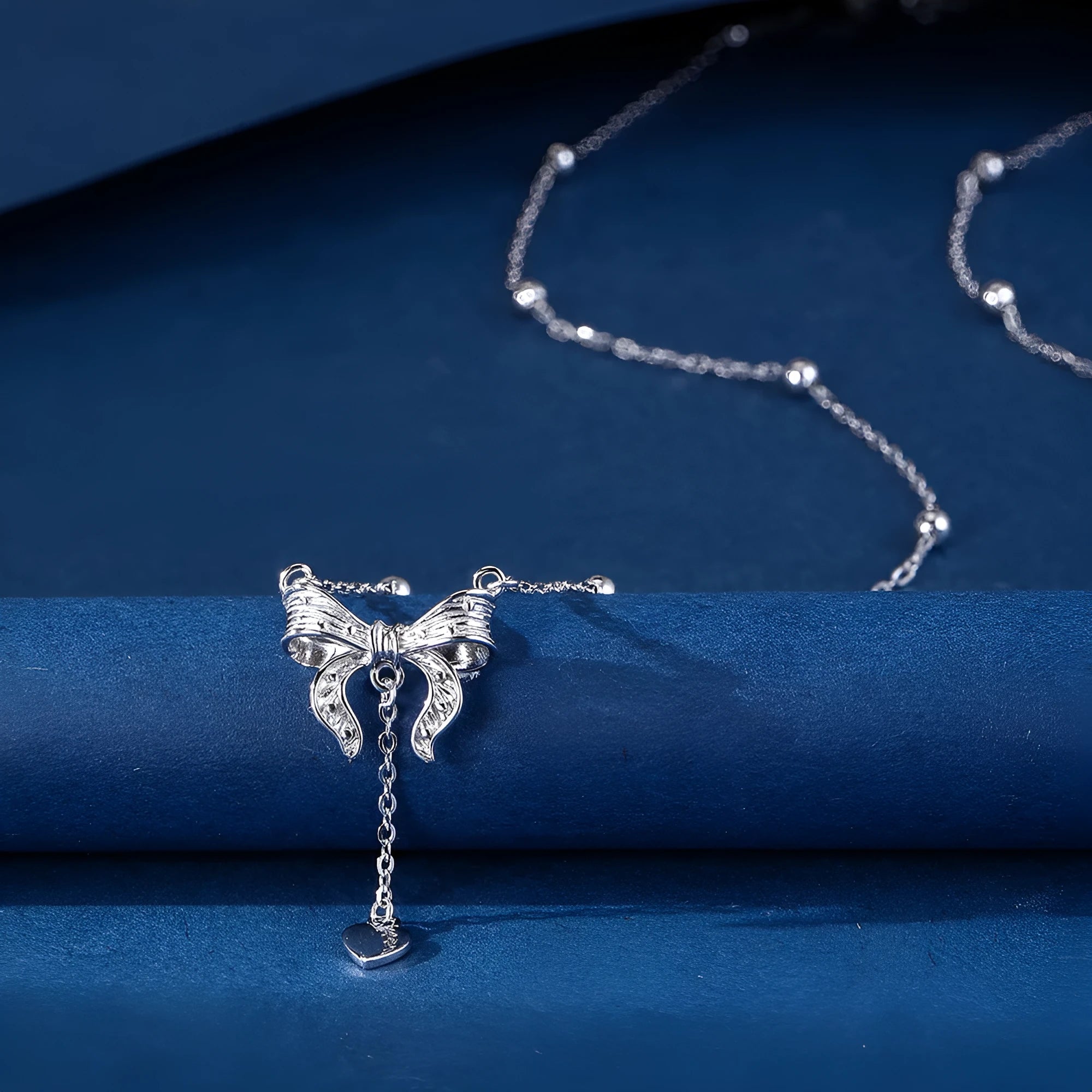 S925 silver butterfly heart clavicle chain necklace with adjustable O-ring chain and bow detailing