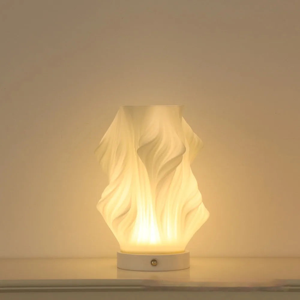 3D printed cylindrical vase night lamp with glass shade in wood colour finish on a bedside table