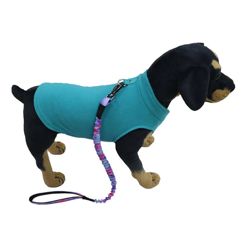 A solid-colour polar fleece dog waistcoat shown in one of nine available colours, sized for a medium dog.