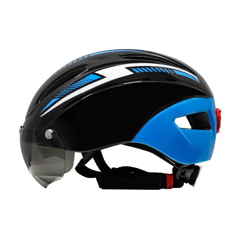 Adult bicycle helmet with integrated red taillight on the rear, shown in a black and blue colour variant.