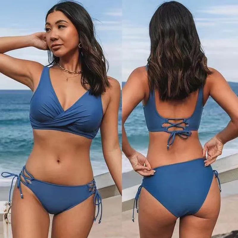 Yellow green women's halter bikini with lace-up front and matching briefs on a mannequin.