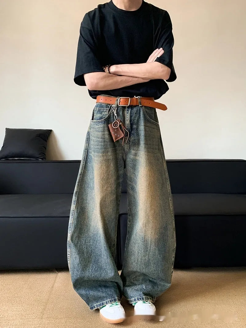 Men's retro blue jeans with distressed machete detailing and slimming wide-leg cut on mid waist design