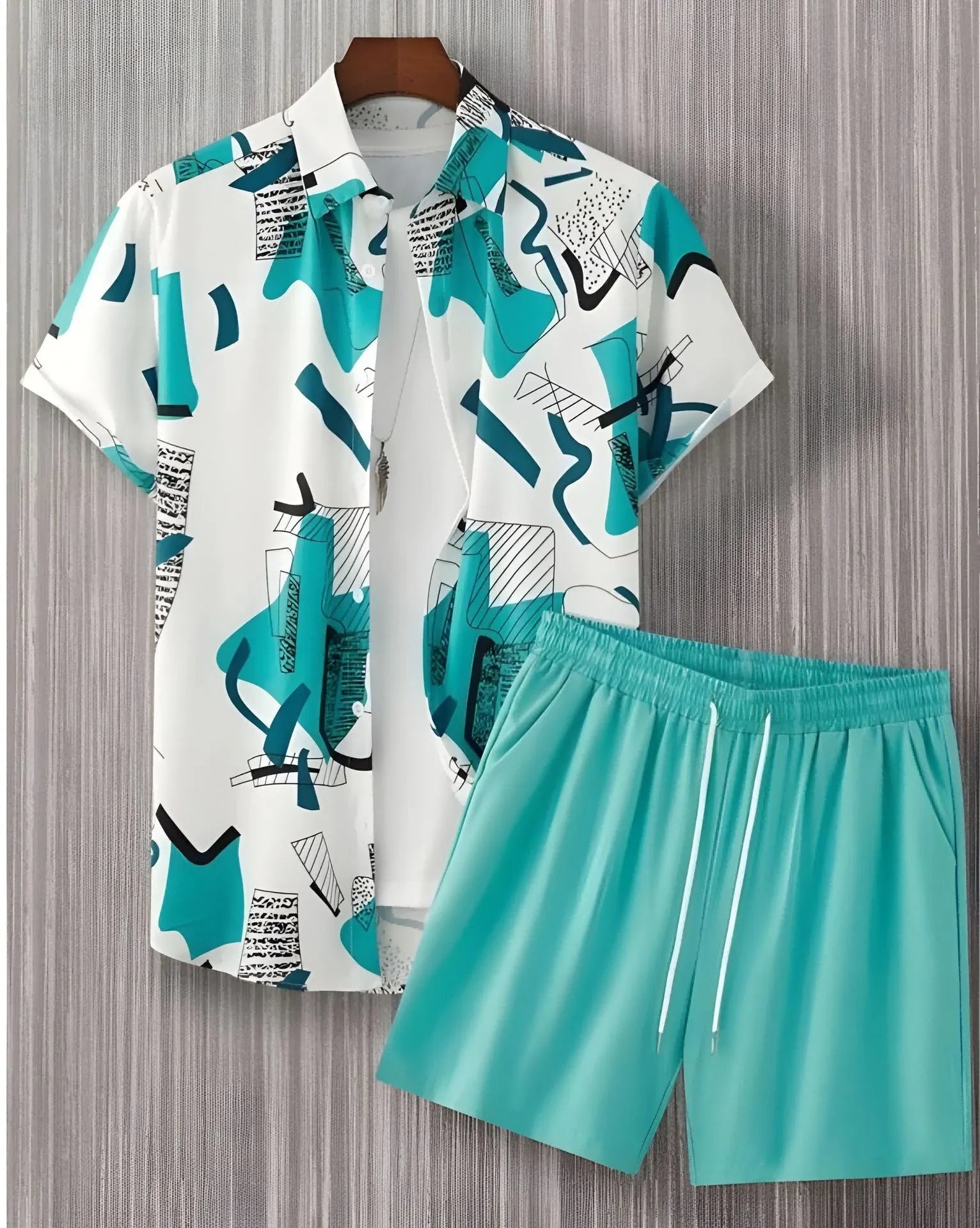 Black and white striped Hawaiian men's pullover shirt and shorts set on a model, loose fit, short sleeves.
