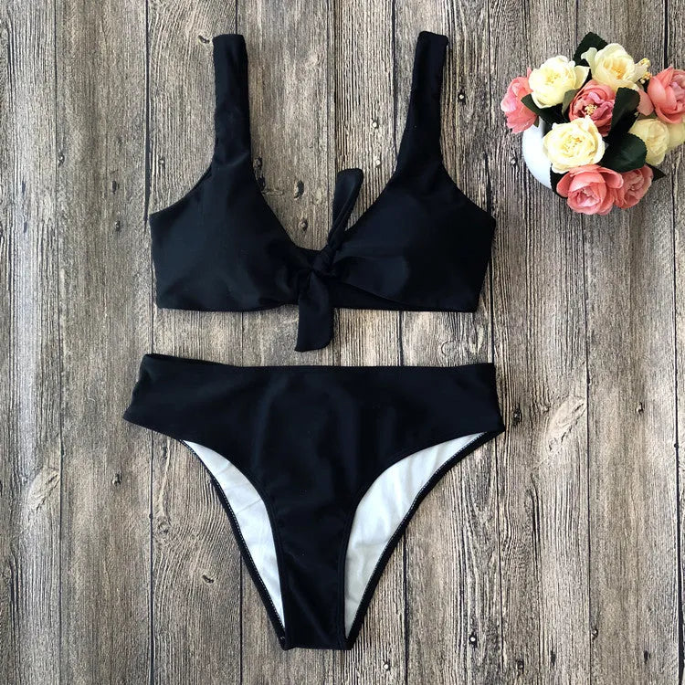 Women's two-piece bikini set in solid colour with bra top and matching panties