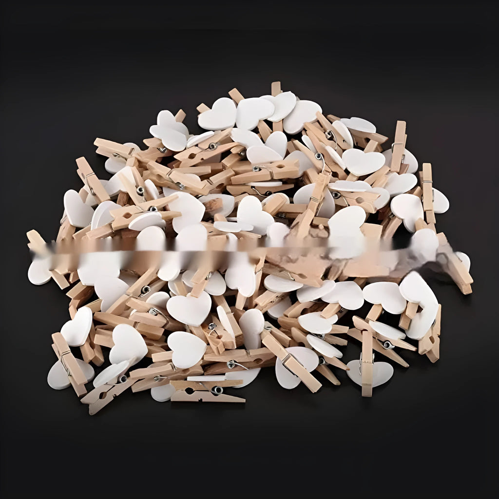 Five handmade solid wood heart-shaped clips in red, white, yellow, rose, and pink colours.