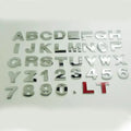 Zinc alloy metal car letter sticker in 3D style, shown in silver finish, approx 2.5cm size.