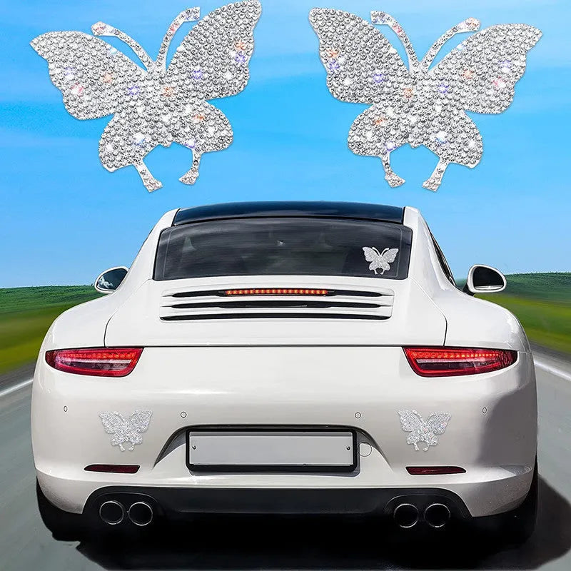 Diamond-encrusted glass car sticker with butterfly and bear claw design for vehicle decoration.
