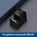 Zinc alloy and leather glasses clip for car dashboard in black, grey, green, or red.