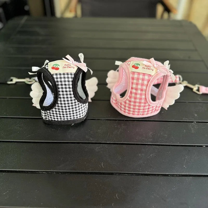 Pink and black cotton chest-back harness lead for small dogs on a white background.