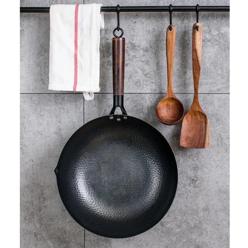 Traditional black iron wok with long wooden handle, 32cm cooking surface
