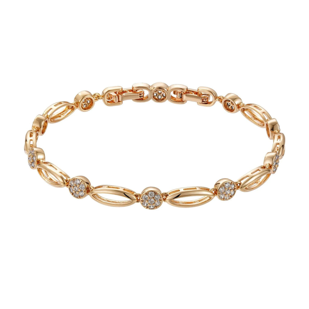 Golden hollow carved copper bracelet in a U-shape for women, showing detailed openwork design.