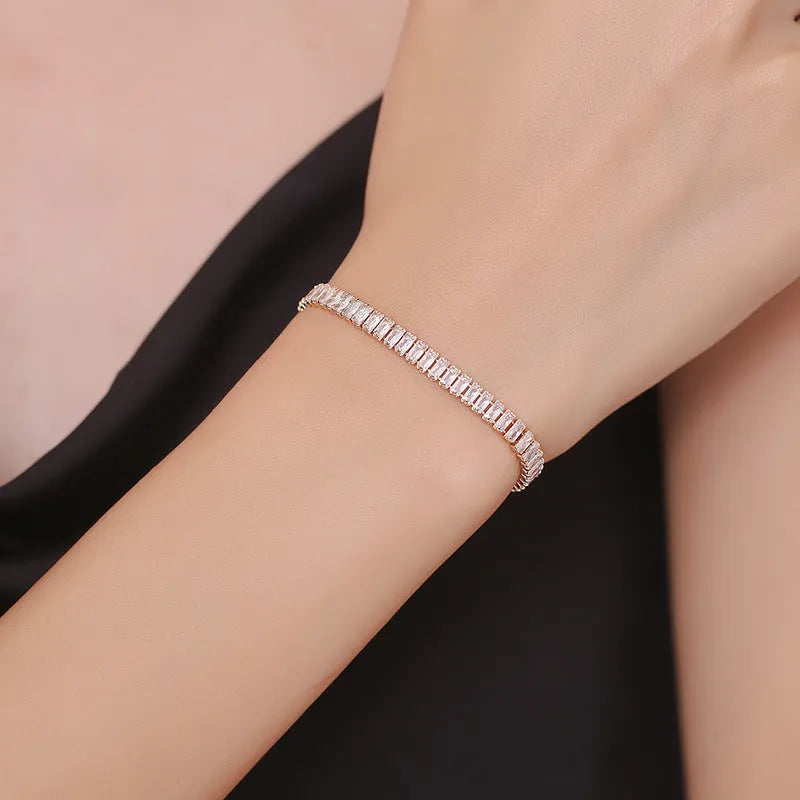 Rectangular brass women's bracelet with diamond zircon treatment in champagne gold colour