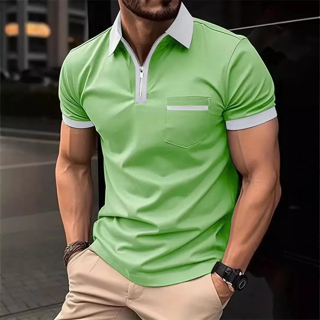 Man wearing a loose-fit short-sleeve casual shirt with a chest pocket and a zipper decoration on the front.