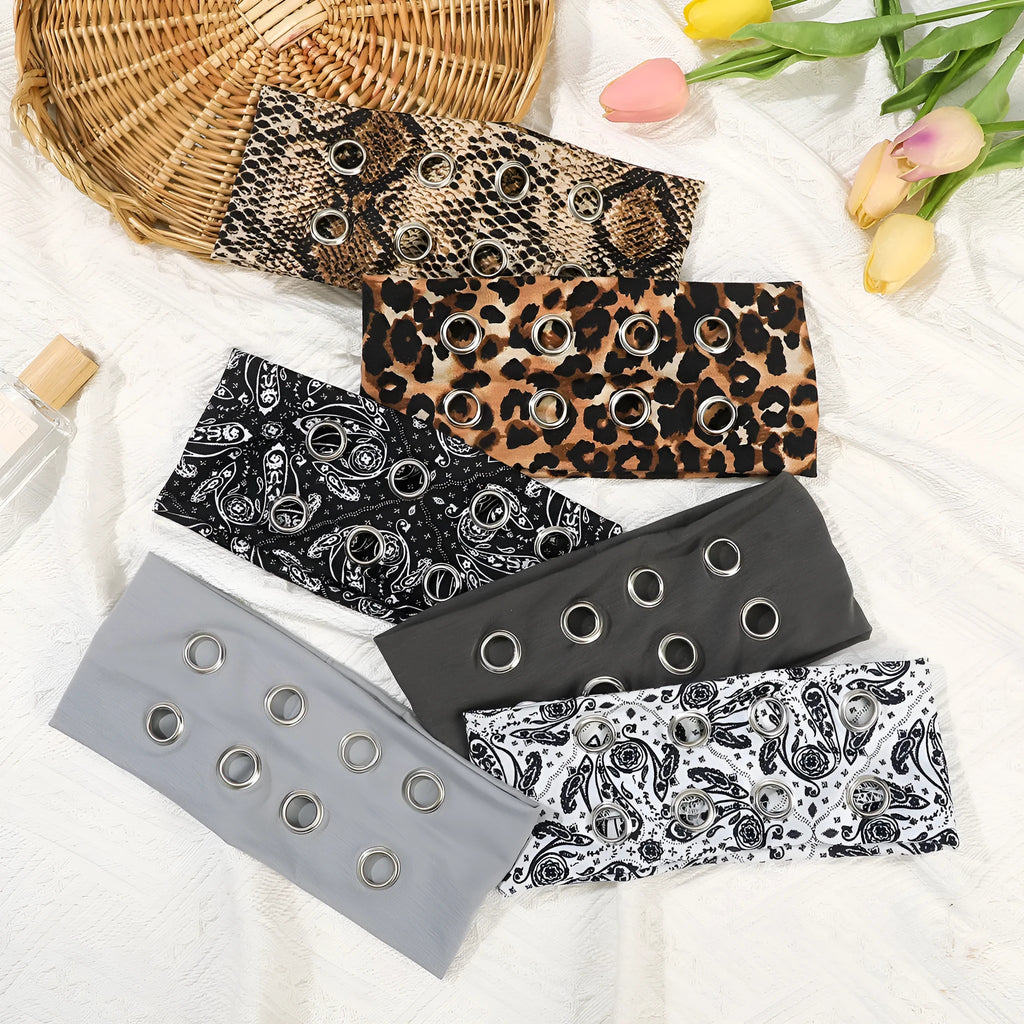 Hollow metal punk hair band with circle decoration in seven colour options on a white background.