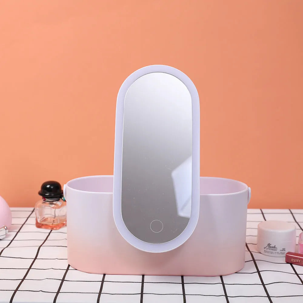 Pink gradient portable LED makeup mirror and storage organiser box with USB port.