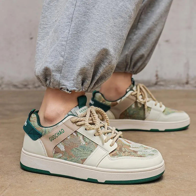 Men's low top lace-up sneakers with oil painting colour block pattern, PU upper, rubber sole, flat heel