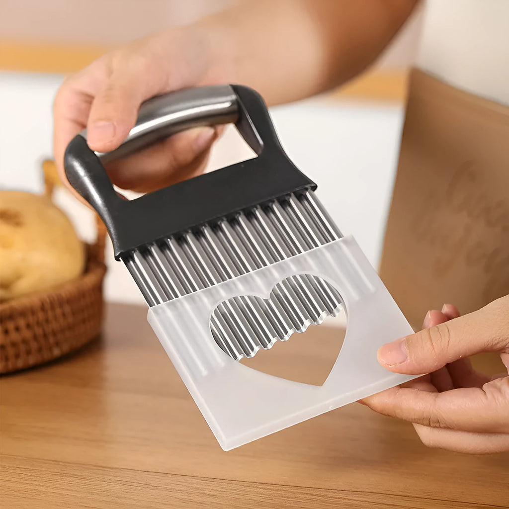 Stainless steel potato wave knife on a kitchen surface.