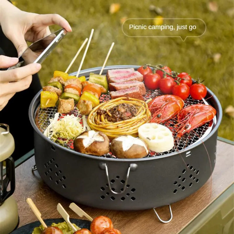 Portable stainless steel barbecue grill with detachable components and storage bag