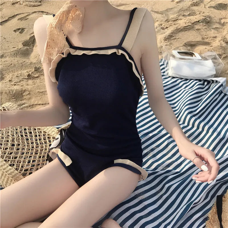 Conservative women's one-piece swimsuit with slingback straps in nylon fabric showing colour options