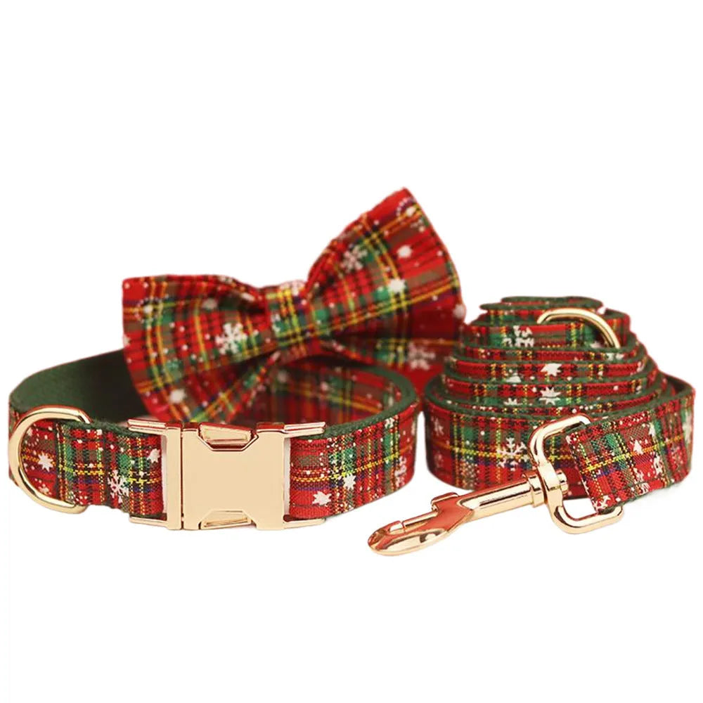 Green snowflake pattern Christmas dog collar set with matching leash, bow, and vest