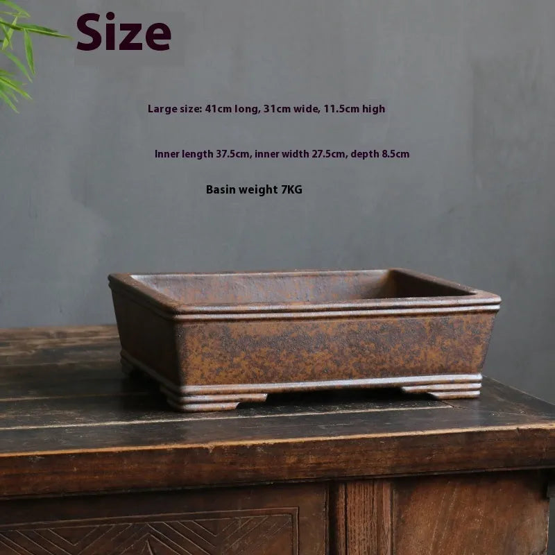 A rectangular purple sand bonsai pot with a textured firewood burning pattern, shown in two sizes.