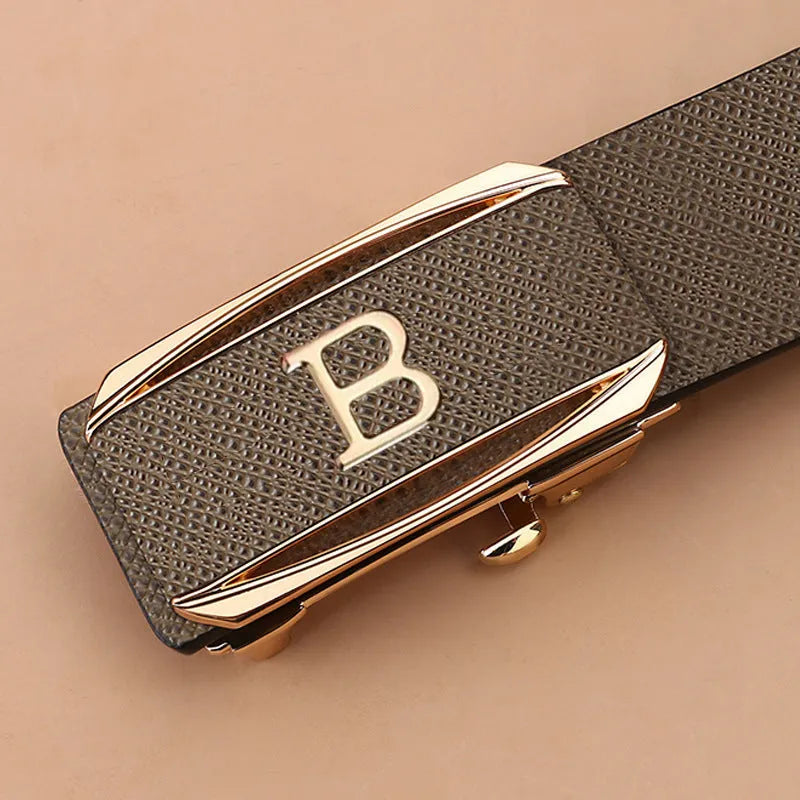 Genuine leather automatic buckle belt with alloy buckle, black gold finish, on display