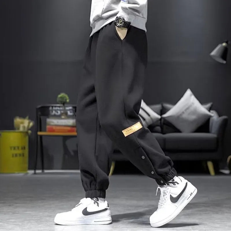 Cotton blend velvet padded skinny ankle strap casual trousers in black, autumn winter sportswear