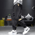 Cotton blend velvet padded skinny ankle strap casual trousers in black, autumn winter sportswear