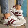 Wine red Cortez Retro low-top sneakers with a cross-strap and breathable mesh panels.