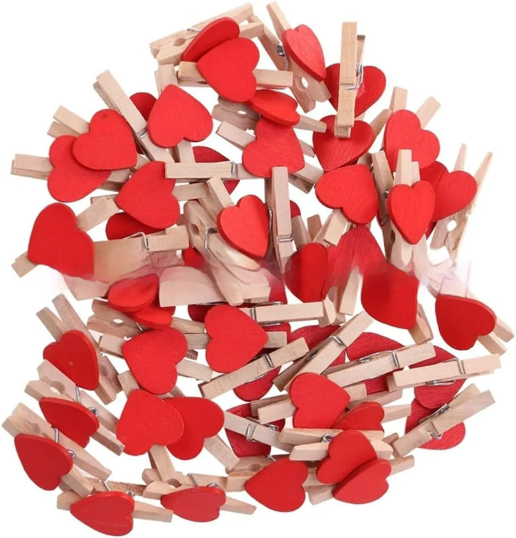 Five handmade solid wood heart-shaped clips in red, white, yellow, rose, and pink colours.