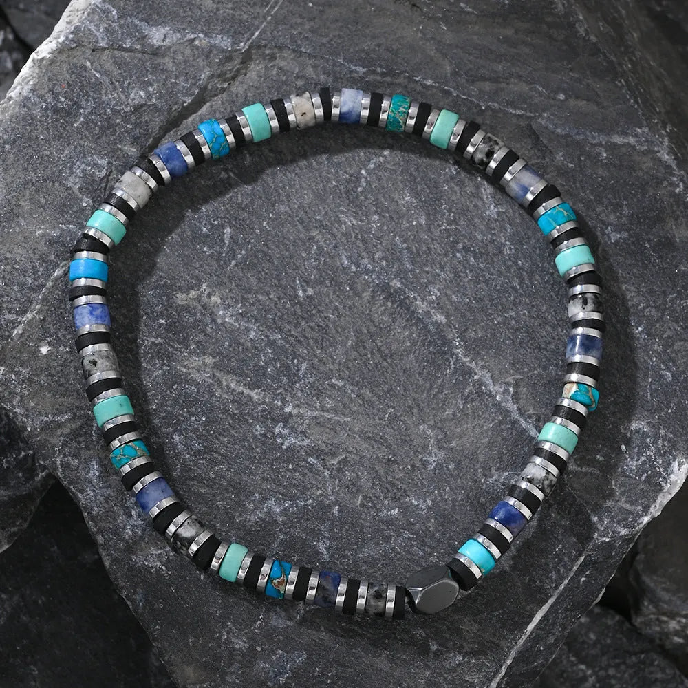 Cylindrical semi-precious stone bracelet with geometric design and hand-woven construction