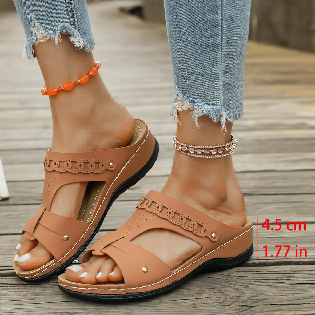 Roman style slippers with fish mouth toe and slope heel in multiple colour options.