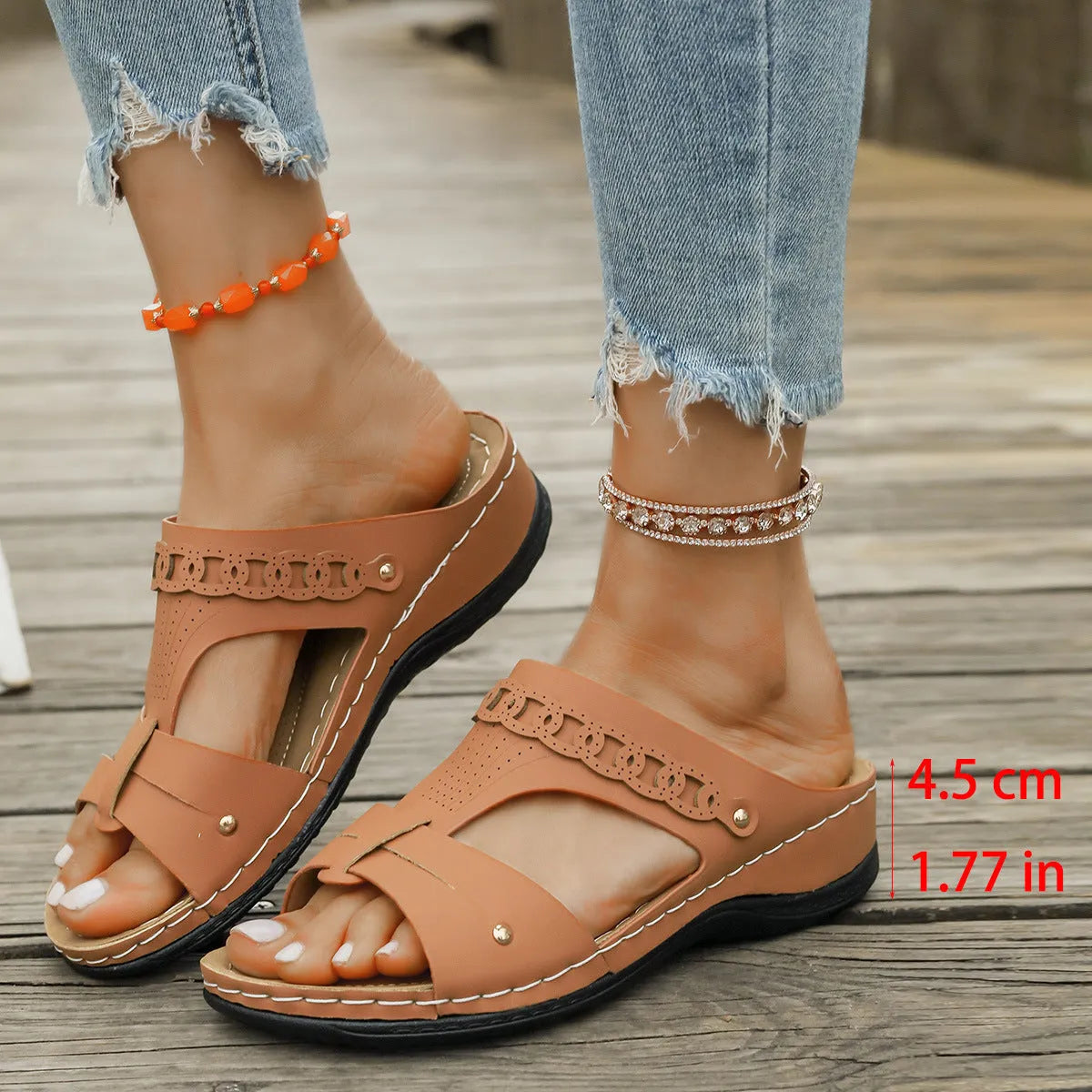 Roman style slippers with fish mouth toe and slope heel in multiple colour options.