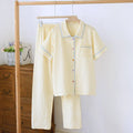 Women's washed cotton gauze short-sleeve top and loose trousers set in a floral or plaid print.