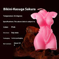 Low temperature soy wax massage candle in a bikini shape, shown in rose red, spring pink, and lilac purple colours.