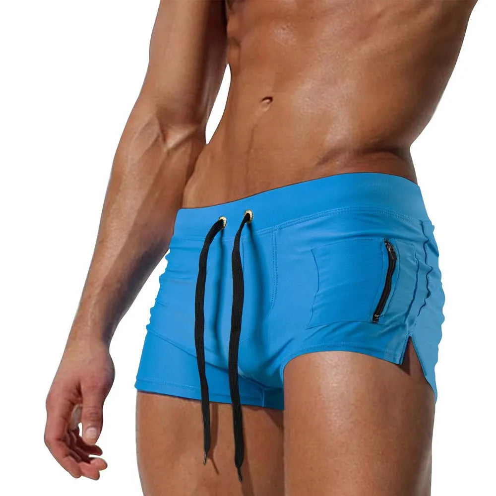 Men's black high-waist swimming trunks with a lace-up front closure.
