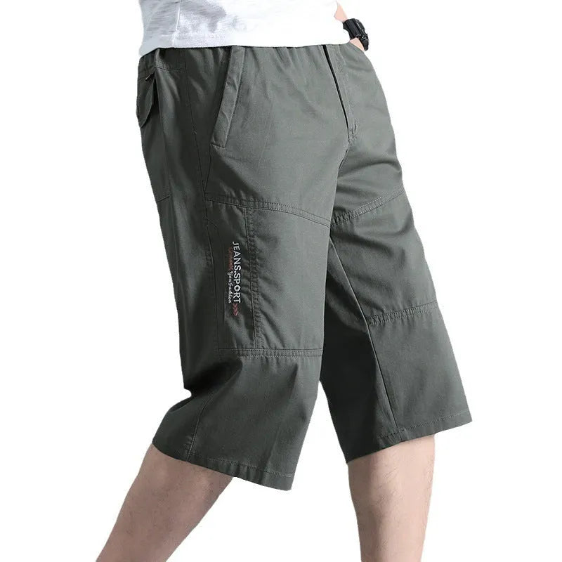 Men's loose cotton sports pants in straight-leg cropped design for summer wear